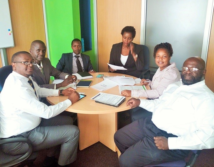 Vincent Aberi of KCB, Gregory Siro of KCB, Joshua Kirui of KCB, Jennifer Chege of KCB, Rose Ndiritu of KUP and Dr. Wilson Endege of KUP.