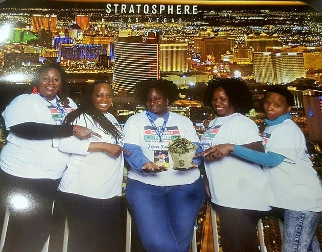 Njeri of CA, Bui of CA, Cathy Jackie of Baltimore, MD holding money, Mary of CA and Joyce of Seattle, WA at Las Vegas